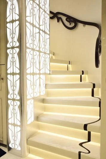a white staircase with glass walls aboard LATONA Yacht for Sale