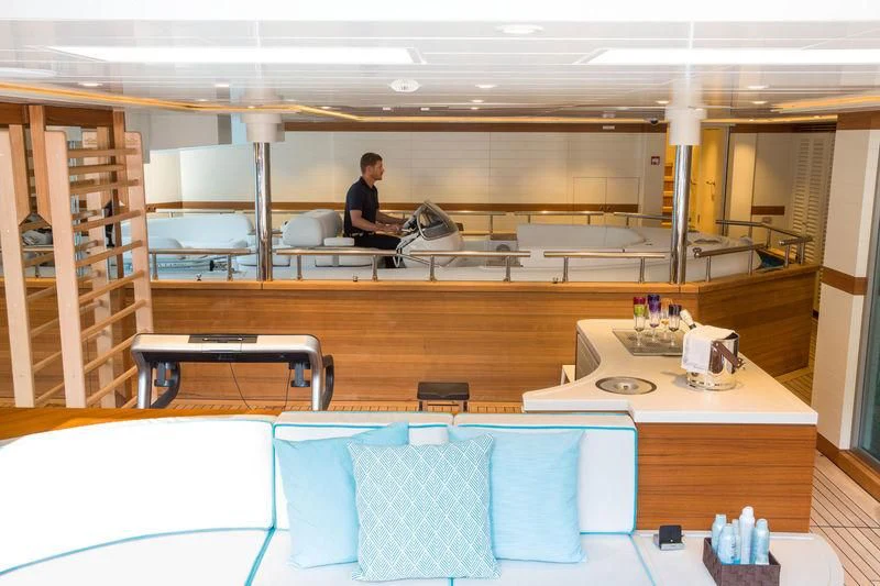 a person sitting at a desk aboard LATONA Yacht for Sale