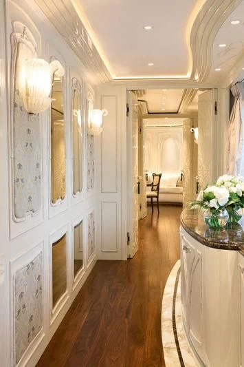 a hallway with a glass door aboard LATONA Yacht for Sale