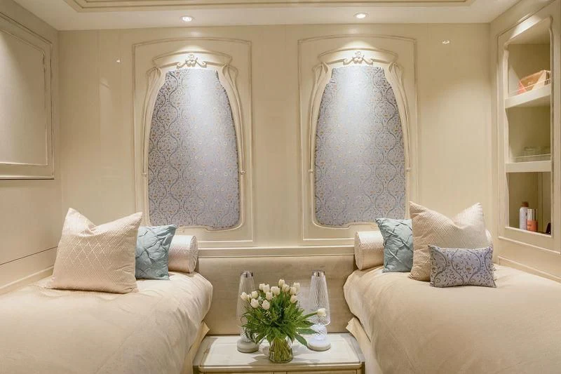 a living room with a large mirror aboard LATONA Yacht for Sale