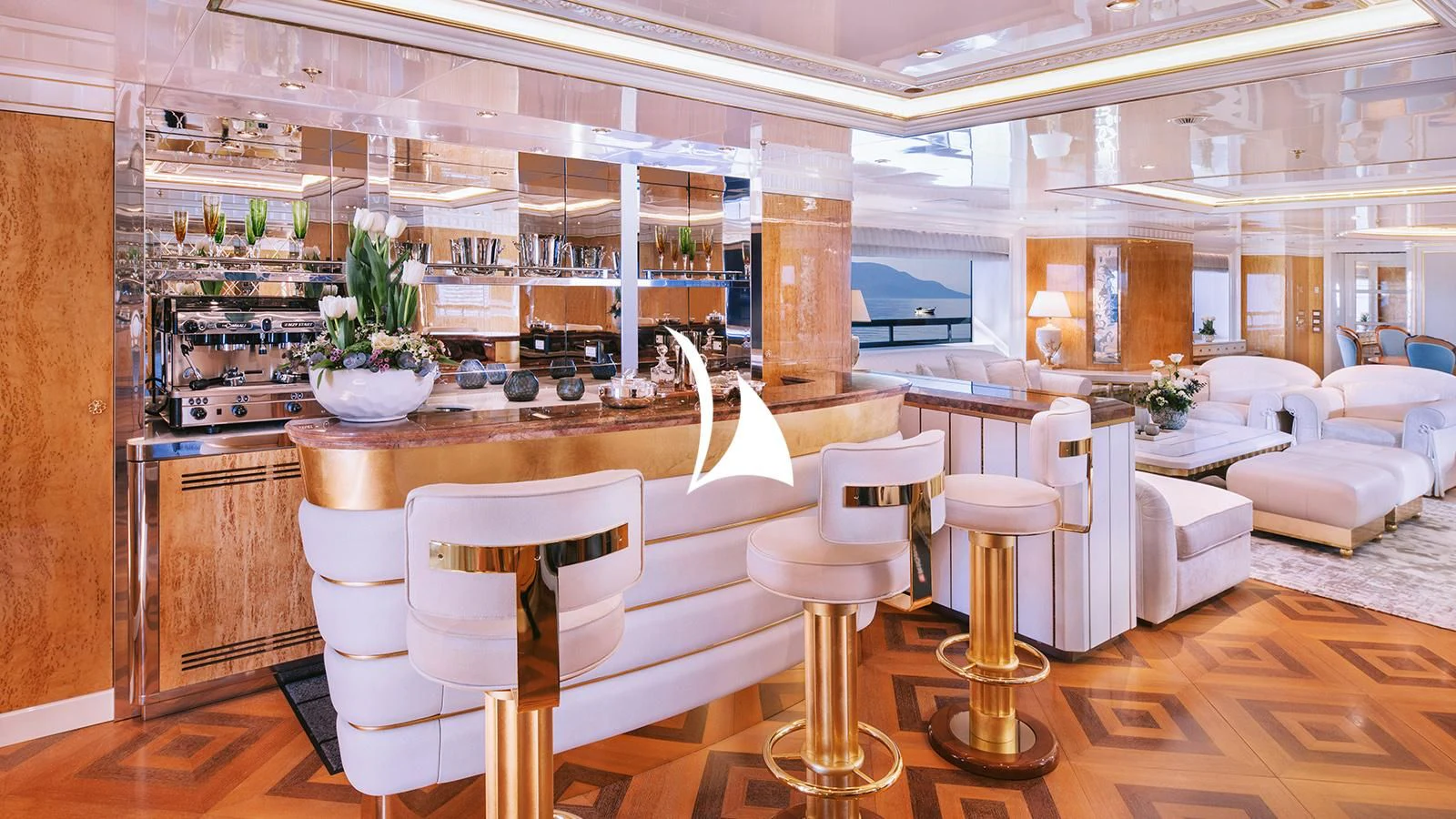 a room with a table chairs and a large window aboard AELIA Yacht for Sale