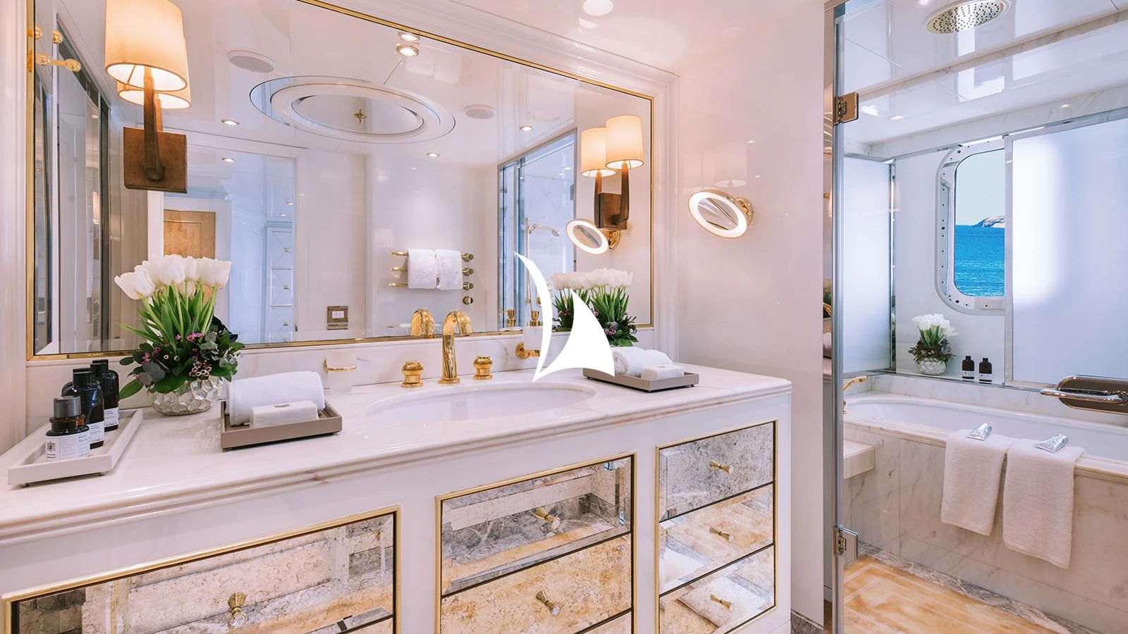 a bathroom with a large mirror aboard AELIA Yacht for Sale
