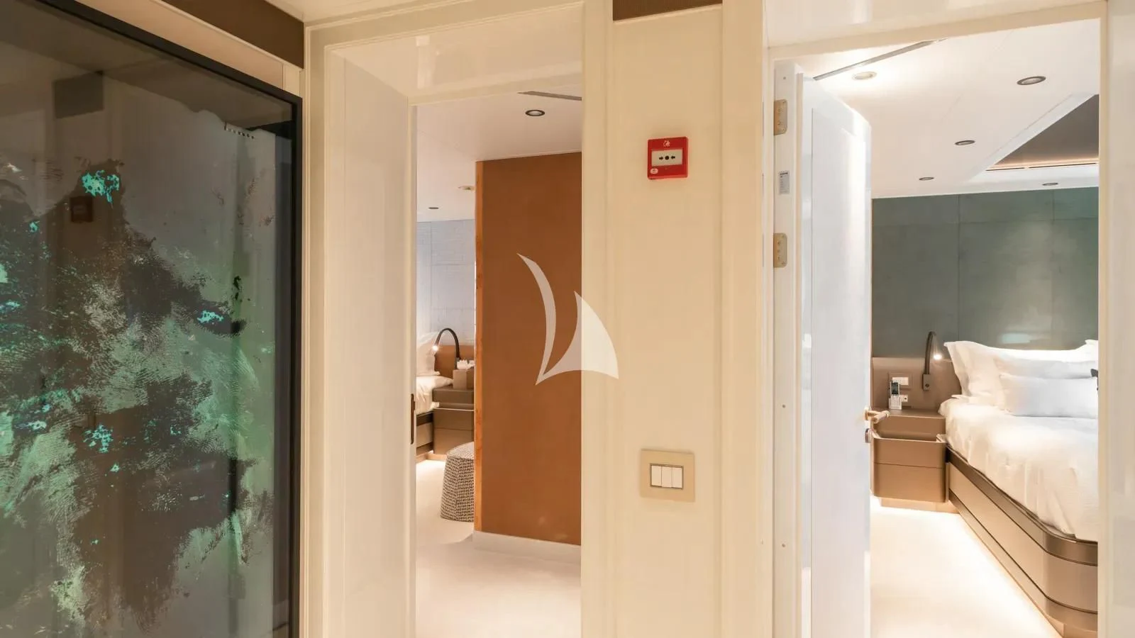 a room with a bed and a door aboard AELIA Yacht for Sale