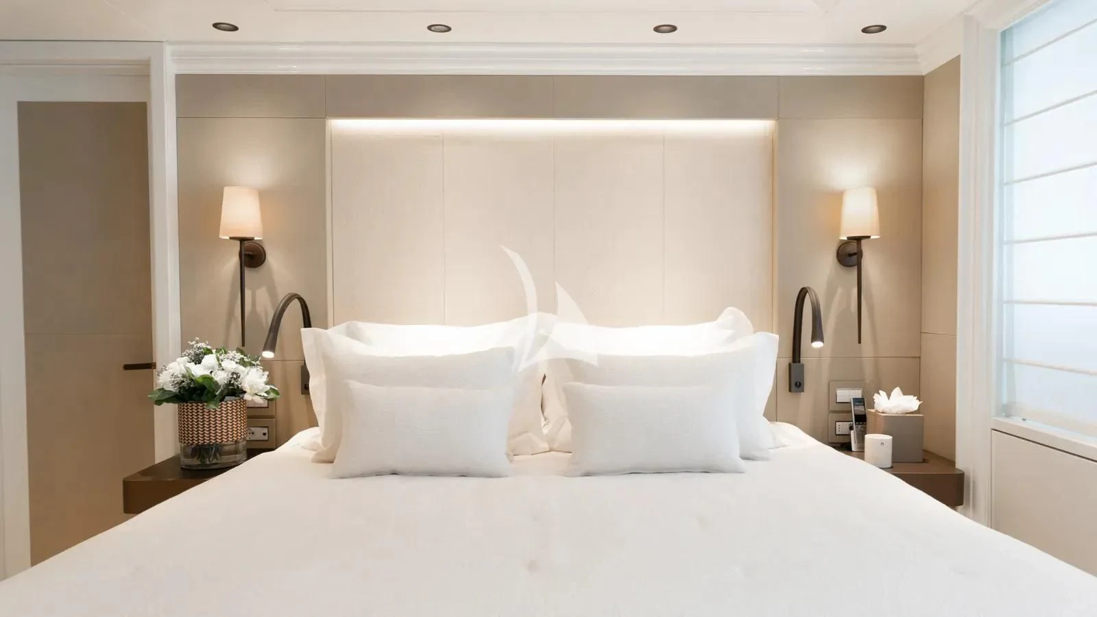a bed with white sheets aboard AELIA Yacht for Sale