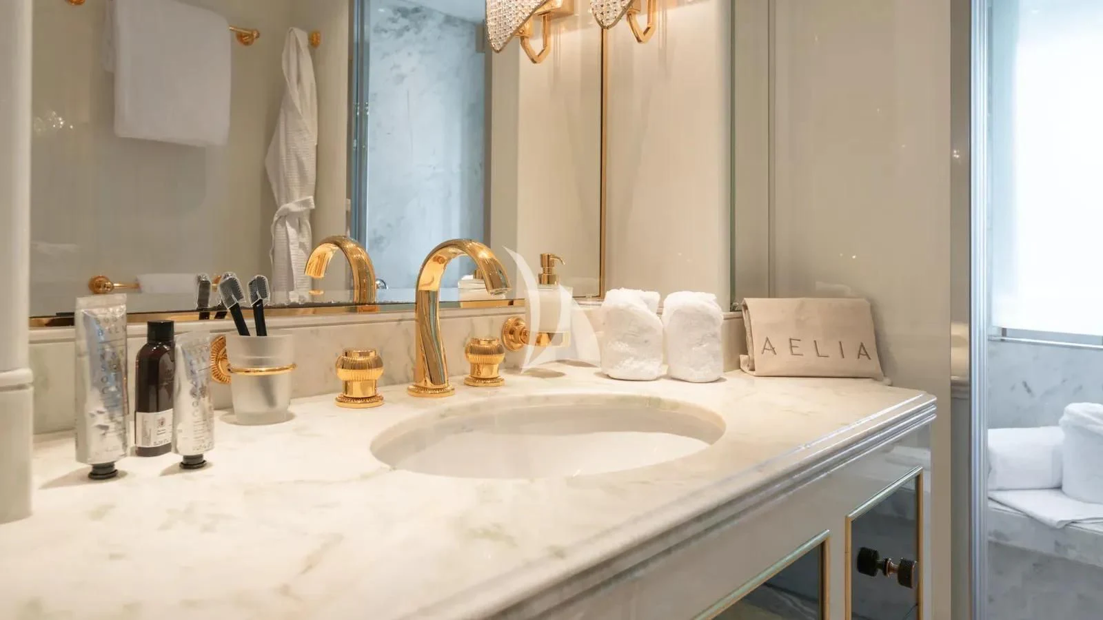 a bathroom with a sink and a mirror aboard AELIA Yacht for Sale