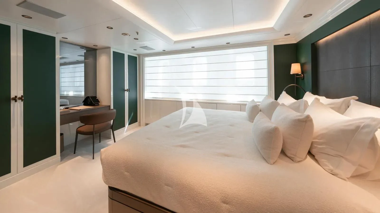 a bed with white sheets aboard AELIA Yacht for Sale