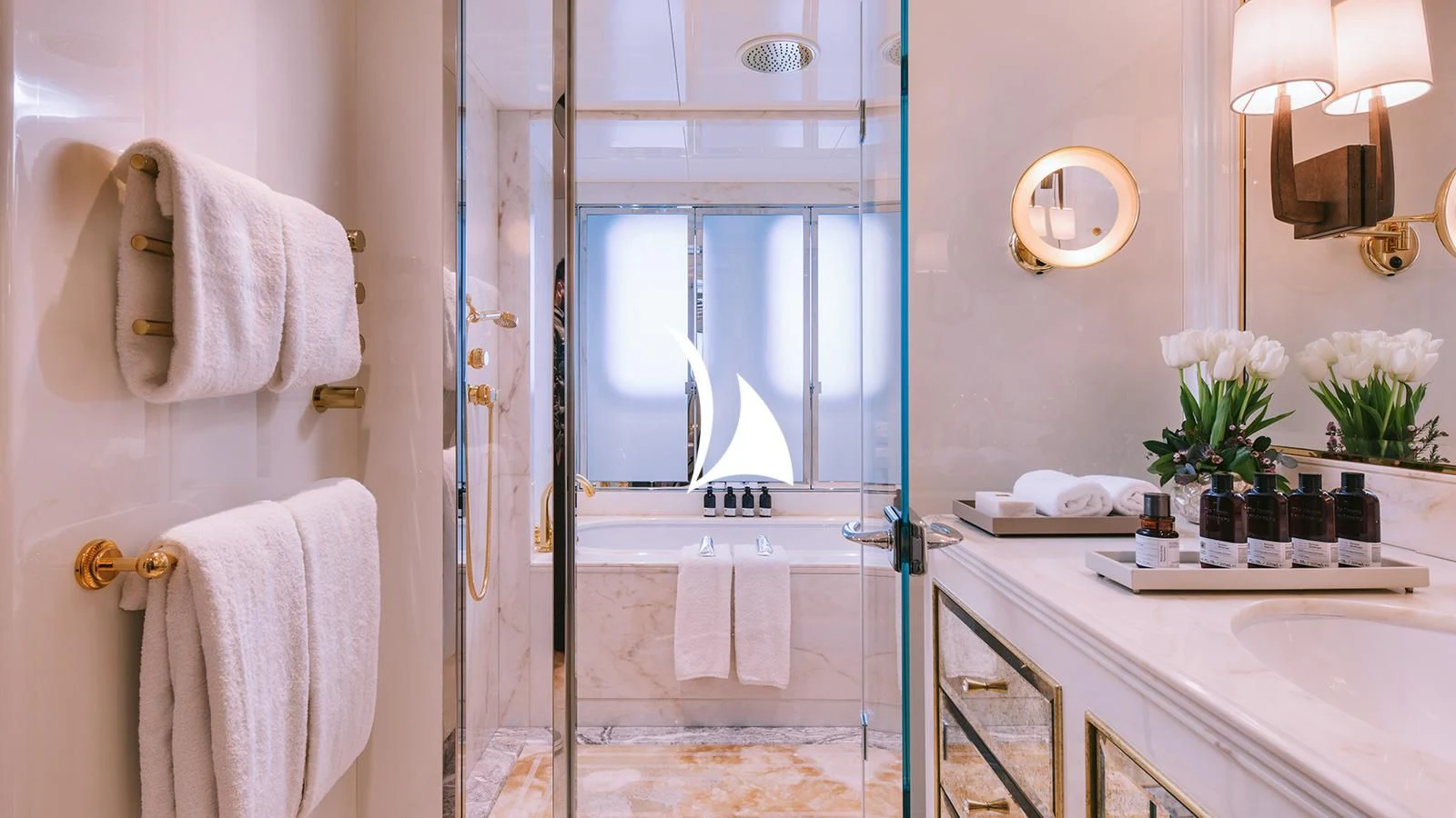 a bathroom with a large mirror aboard AELIA Yacht for Sale