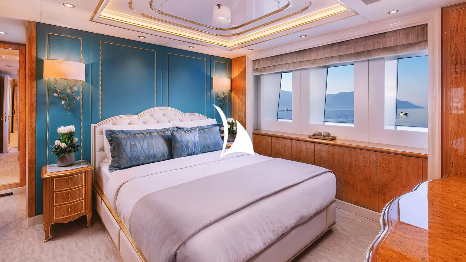 a bed in a room aboard AELIA Yacht for Sale