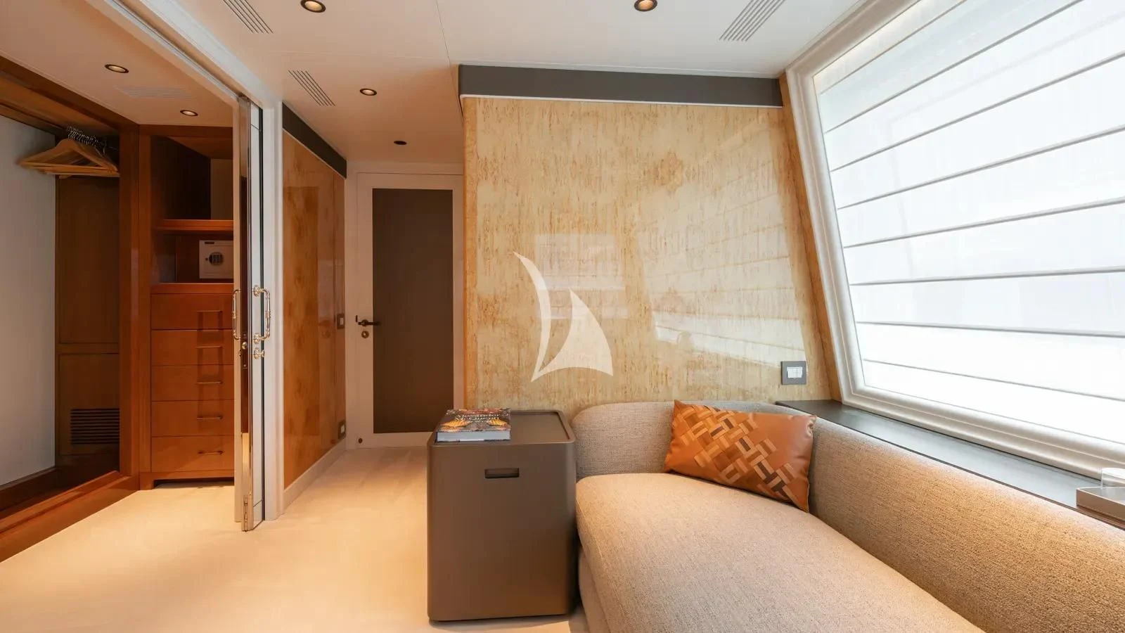 a living room with a couch and a tv aboard AELIA Yacht for Sale