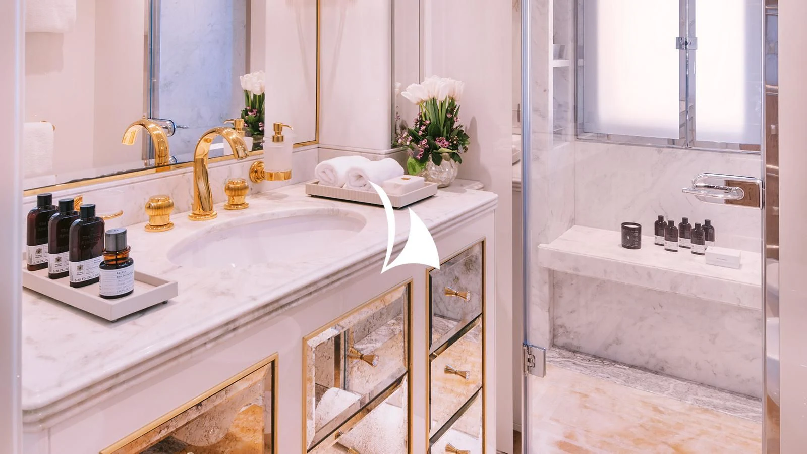 a bathroom with a sink and a mirror aboard AELIA Yacht for Sale