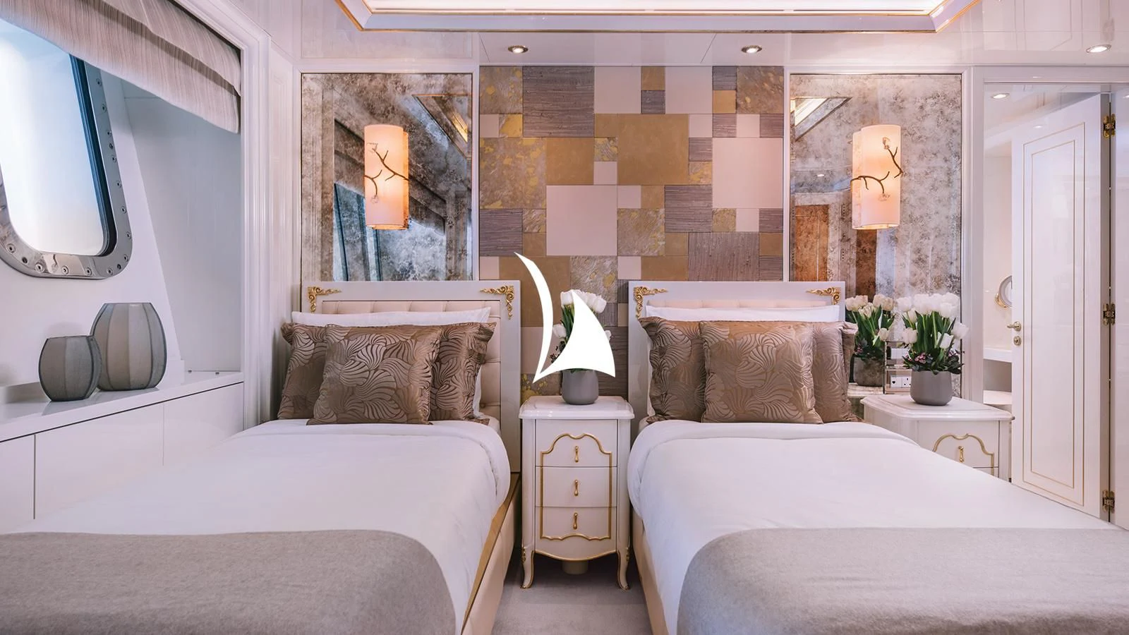 a room with a couch and a table aboard AELIA Yacht for Sale