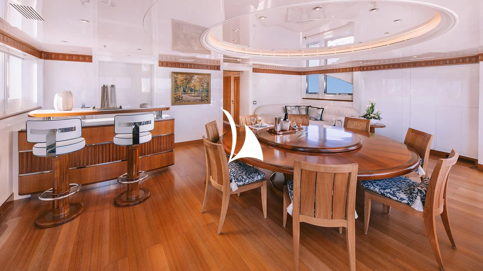 a kitchen with a dining table aboard AELIA Yacht for Sale