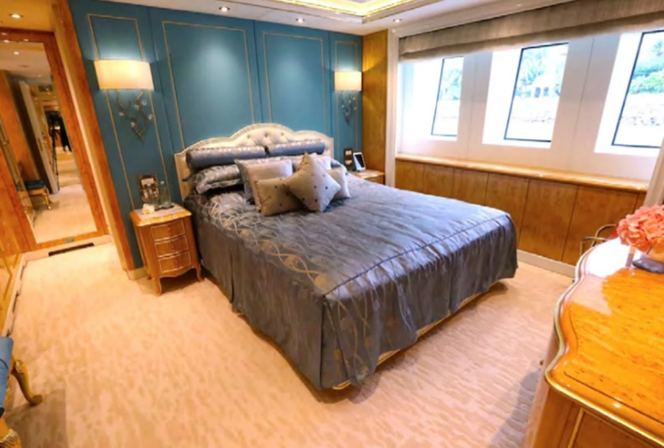 a bed in a room aboard AELIA Yacht for Sale