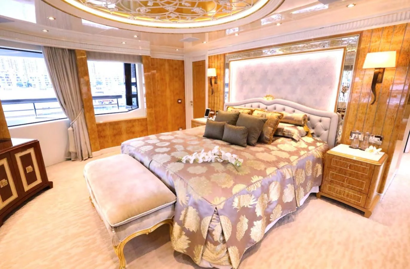 a large bedroom with a large bed aboard AELIA Yacht for Sale