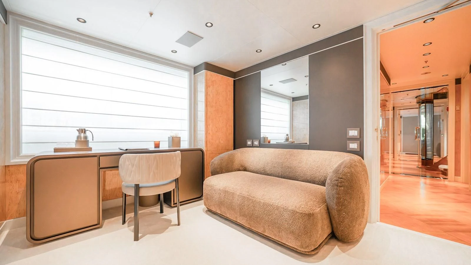 a living room with a couch and a table aboard AELIA Yacht for Sale