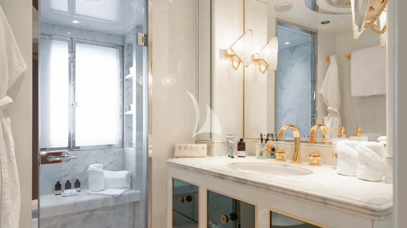 a bathroom with a large mirror aboard AELIA Yacht for Sale