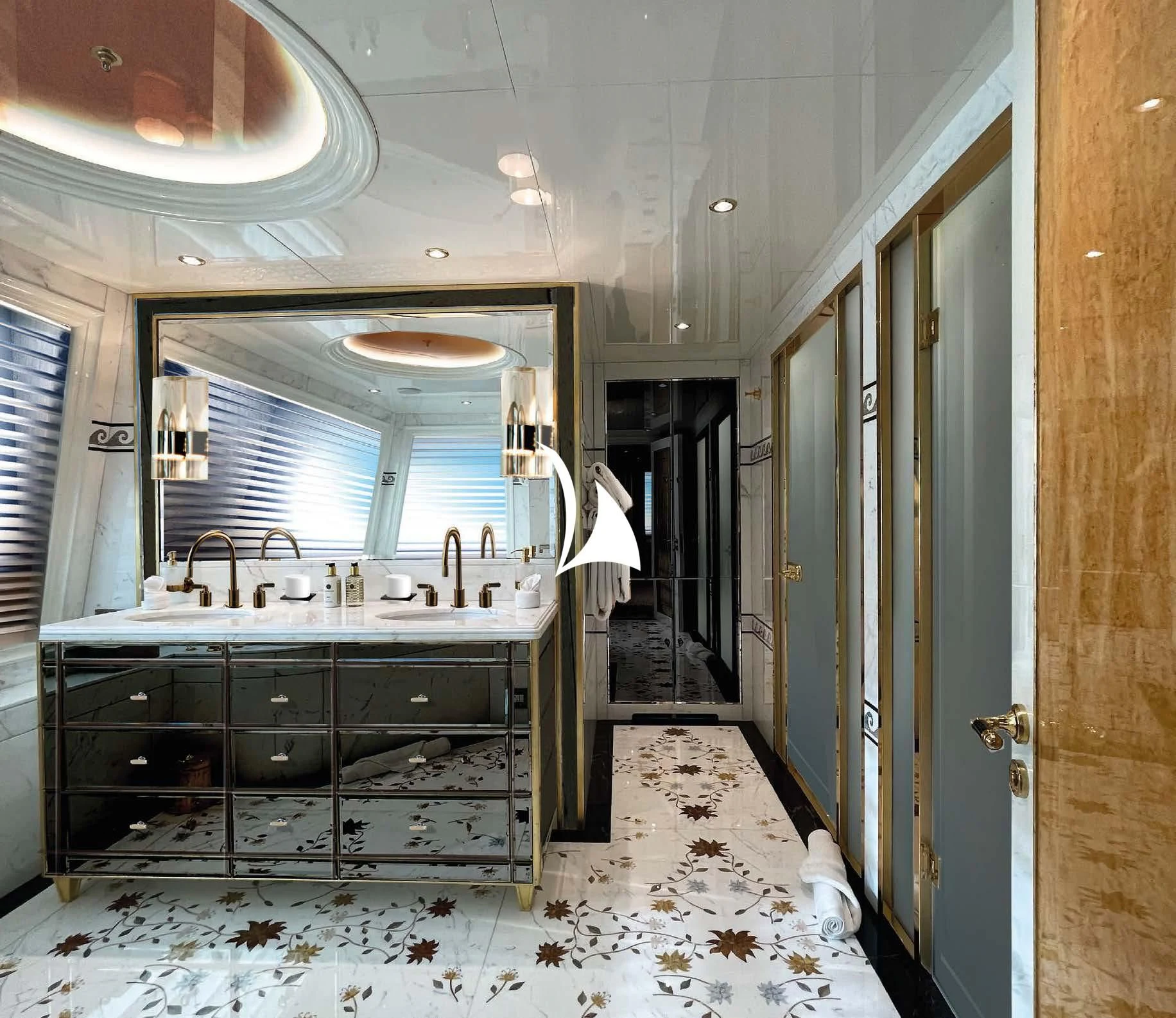 a bathroom with a large mirror aboard AELIA Yacht for Sale