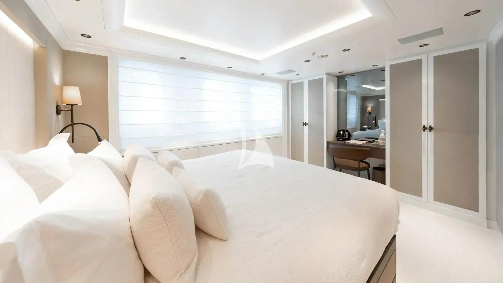a bed with white sheets aboard AELIA Yacht for Sale