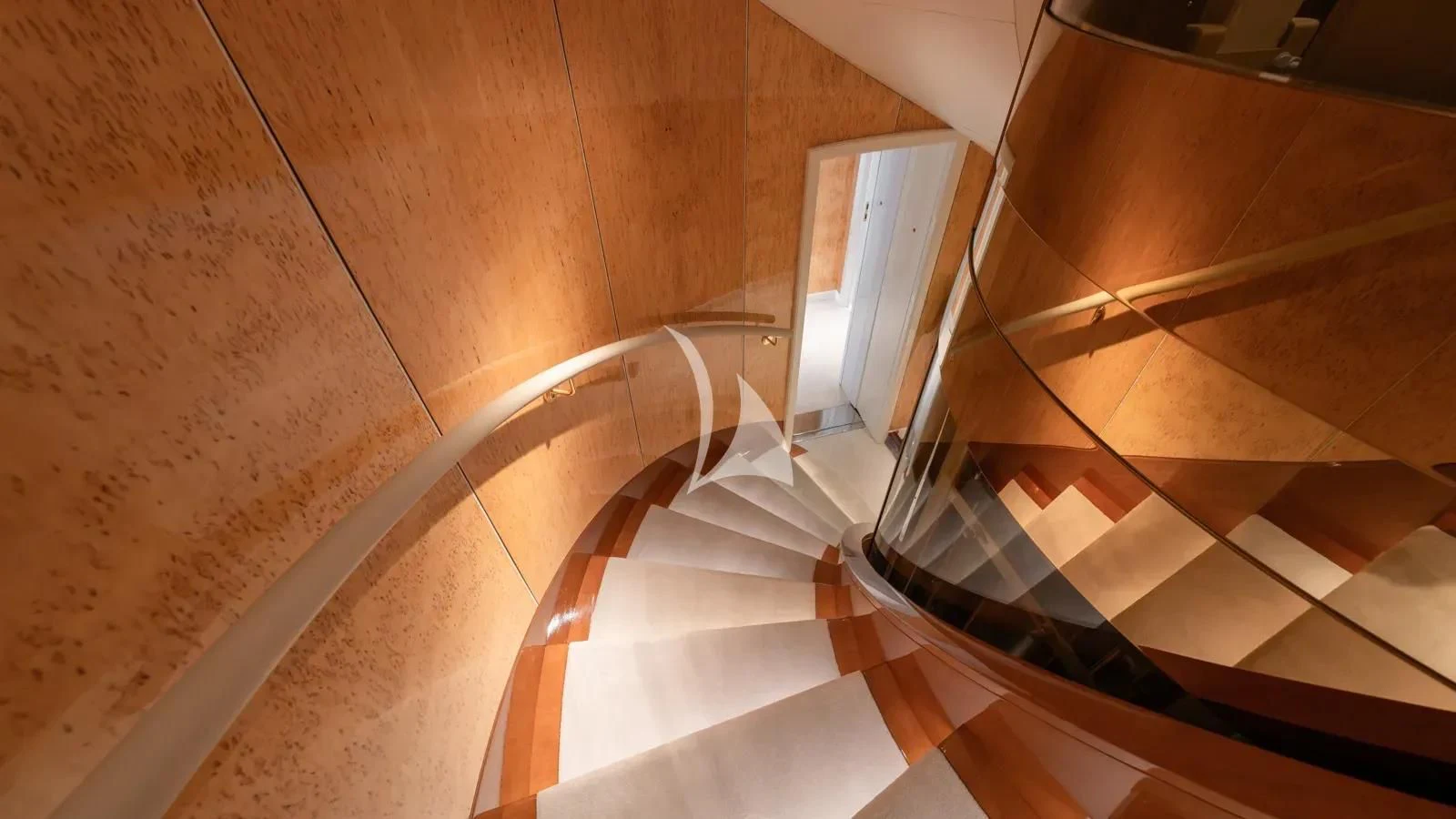 a staircase with a white and black striped floor aboard AELIA Yacht for Sale