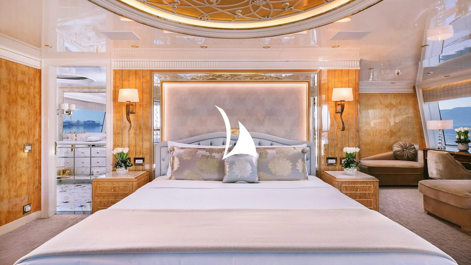 a large bed in a room aboard AELIA Yacht for Sale