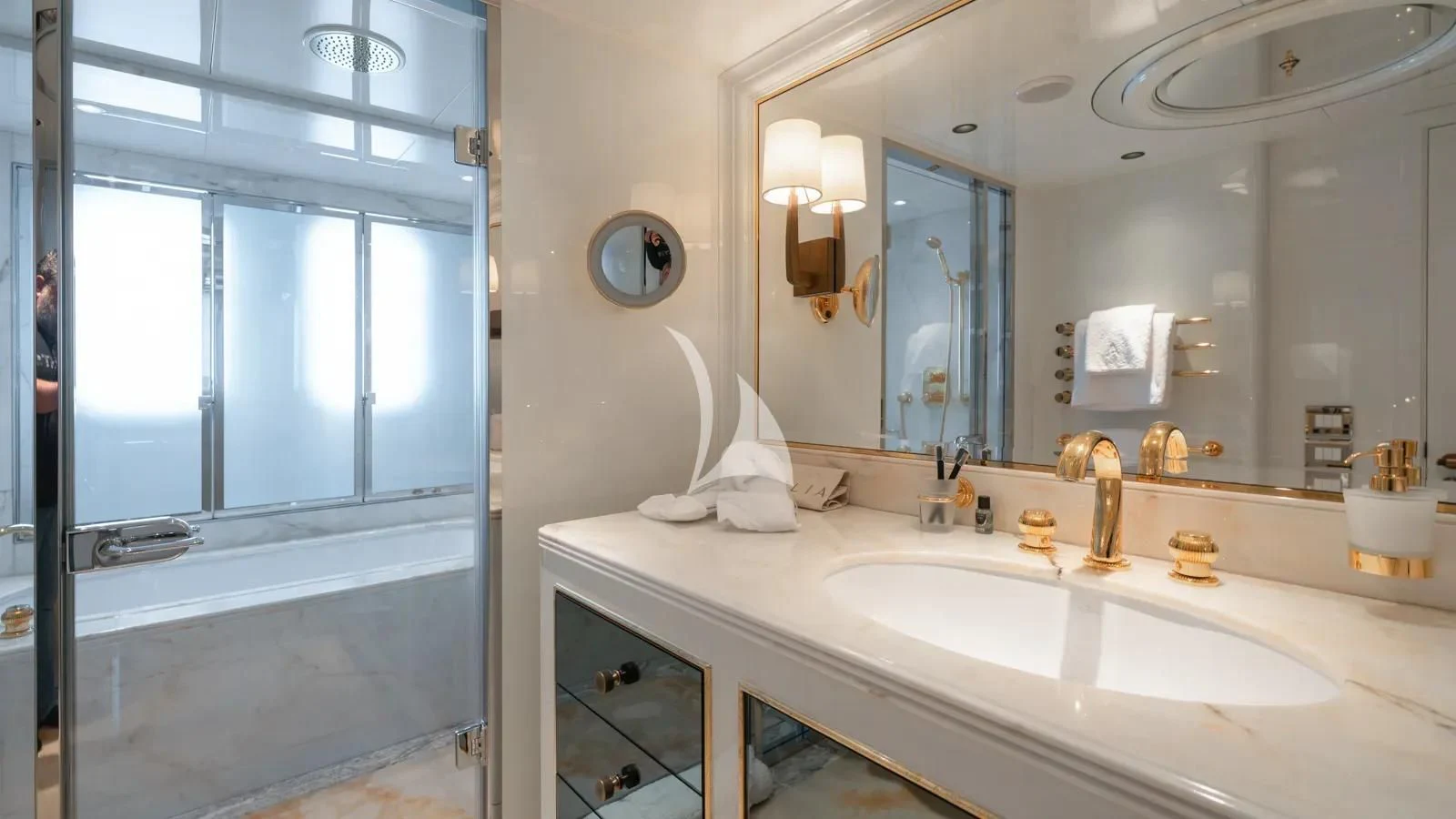 a bathroom with a large mirror aboard AELIA Yacht for Sale