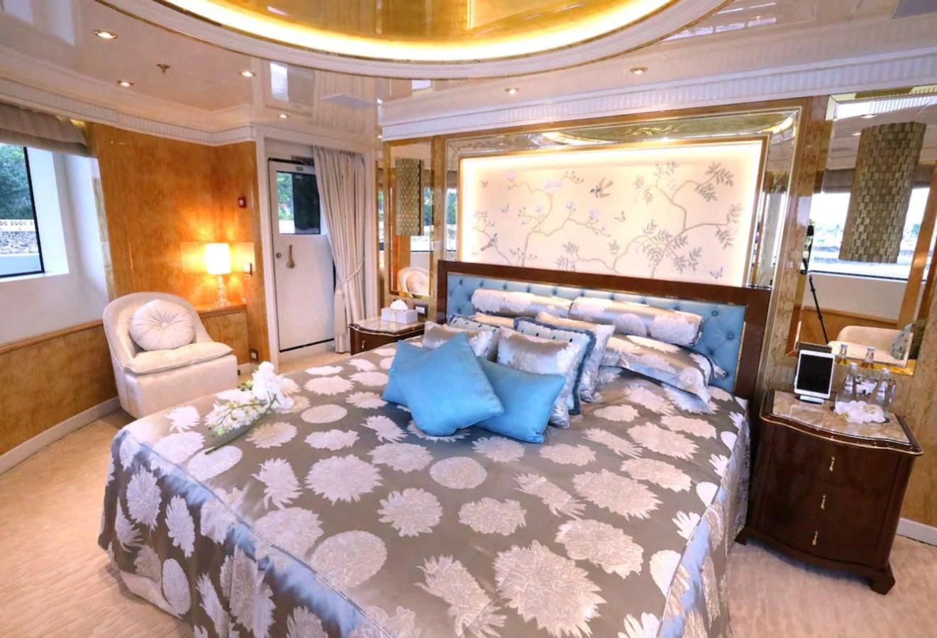 a large bed in a room aboard AELIA Yacht for Sale