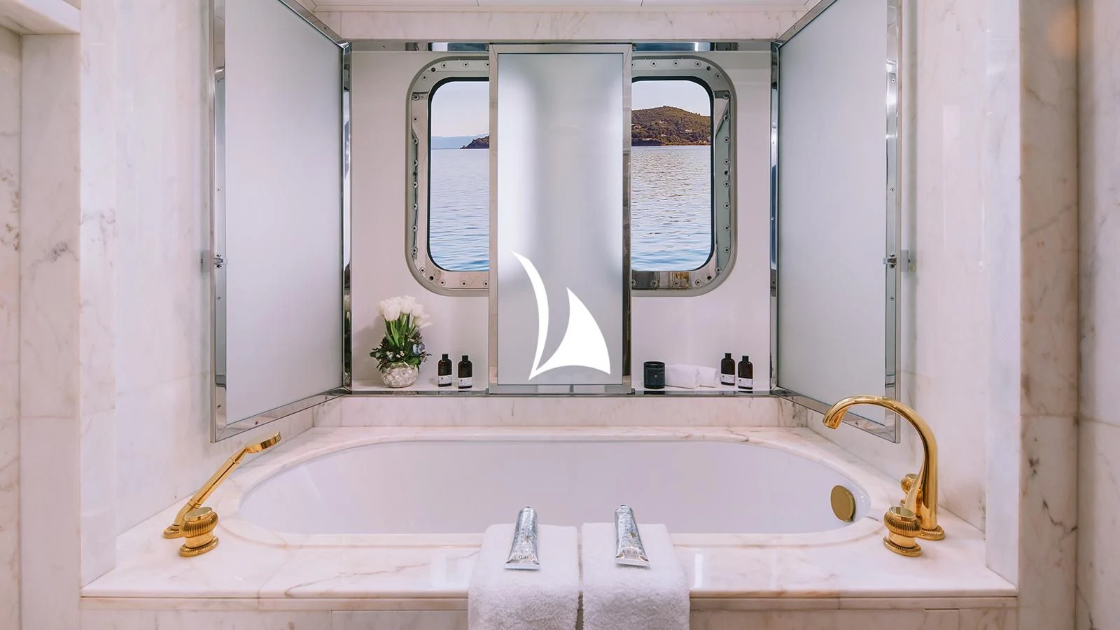a bathroom with a large bathtub aboard AELIA Yacht for Sale