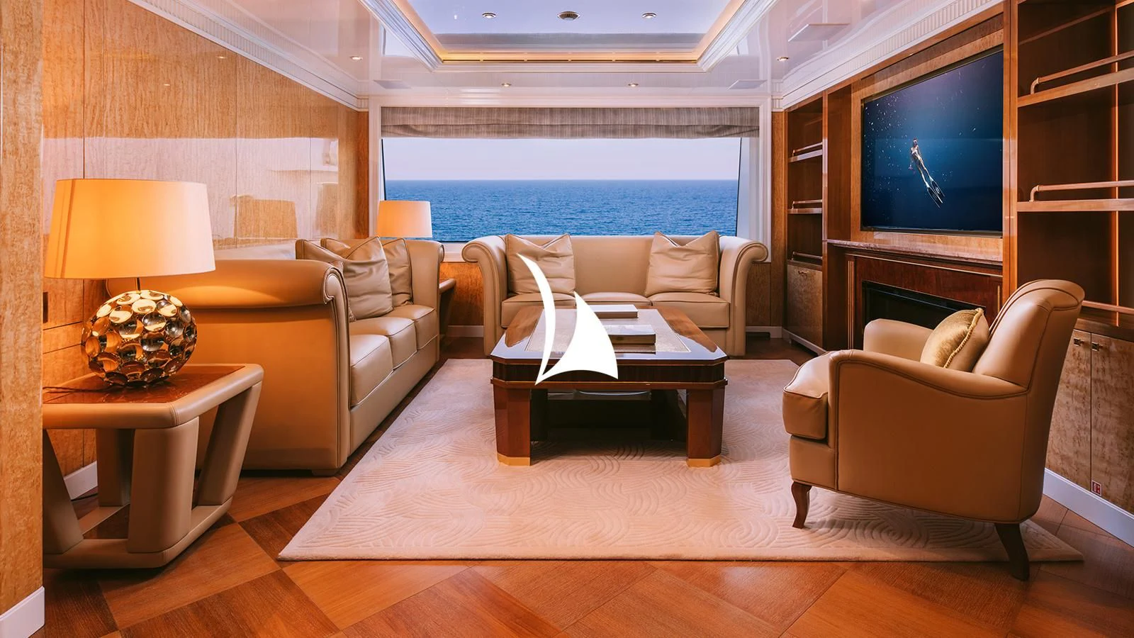 a living room with a large window aboard AELIA Yacht for Sale