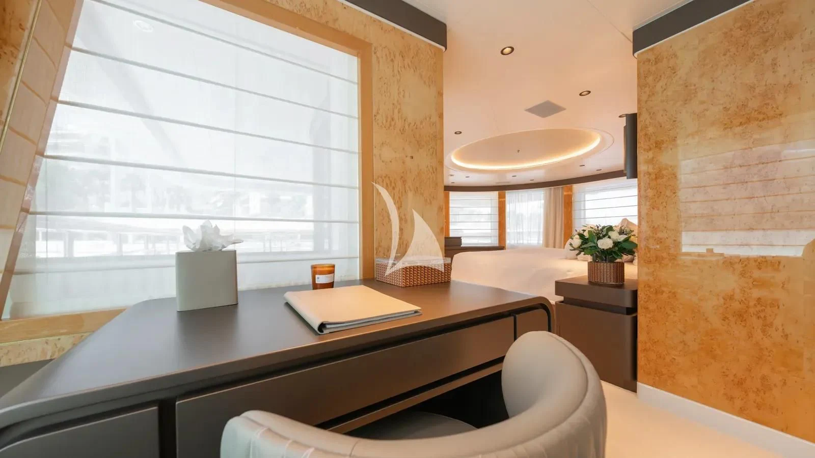 a room with a table and chairs aboard AELIA Yacht for Sale