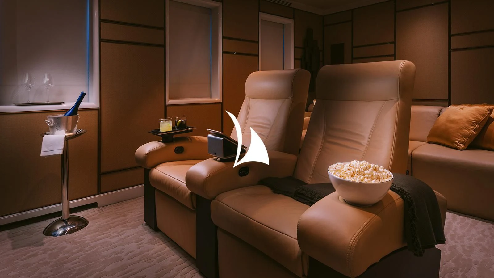 a living room with a couch and a bowl of cereal aboard AELIA Yacht for Sale