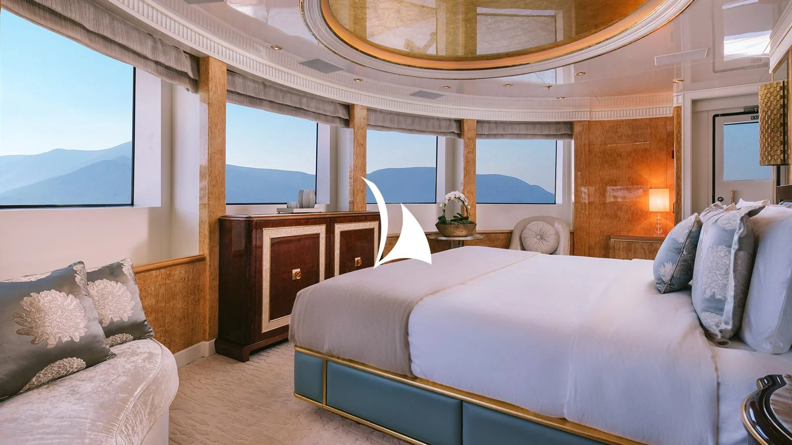 a bedroom with a large bed aboard AELIA Yacht for Sale