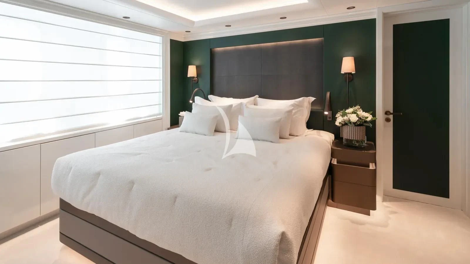 a bed with white sheets aboard AELIA Yacht for Sale