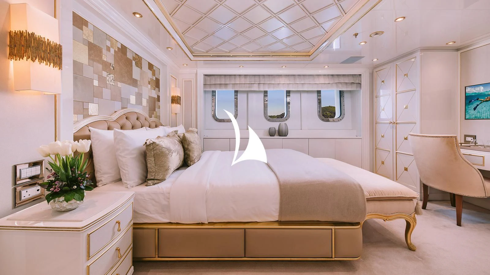 a bed in a room aboard AELIA Yacht for Sale
