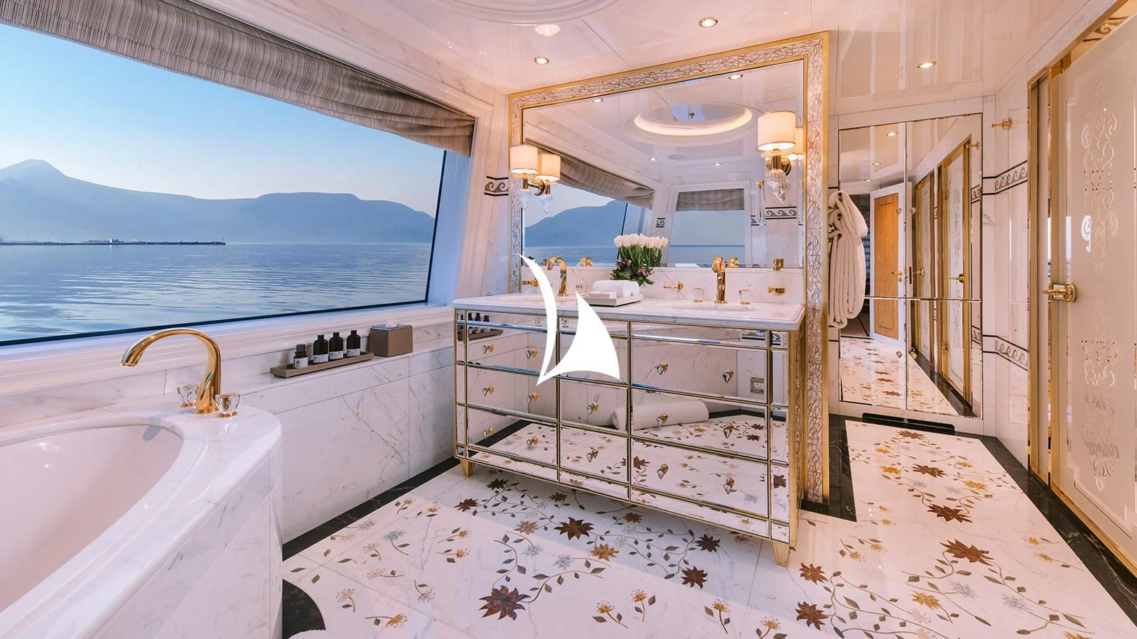 a bathroom with a sink and a bathtub aboard AELIA Yacht for Sale