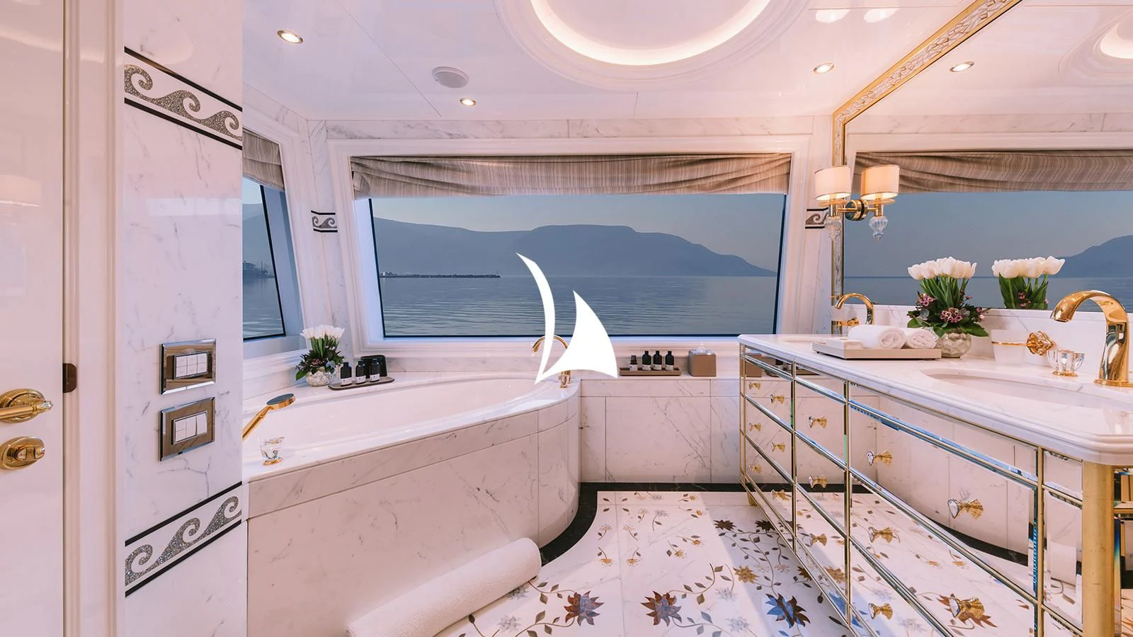 a bathroom with a large window aboard AELIA Yacht for Sale