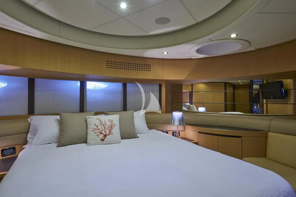 a bed with pillows aboard DANZAS Yacht for Sale