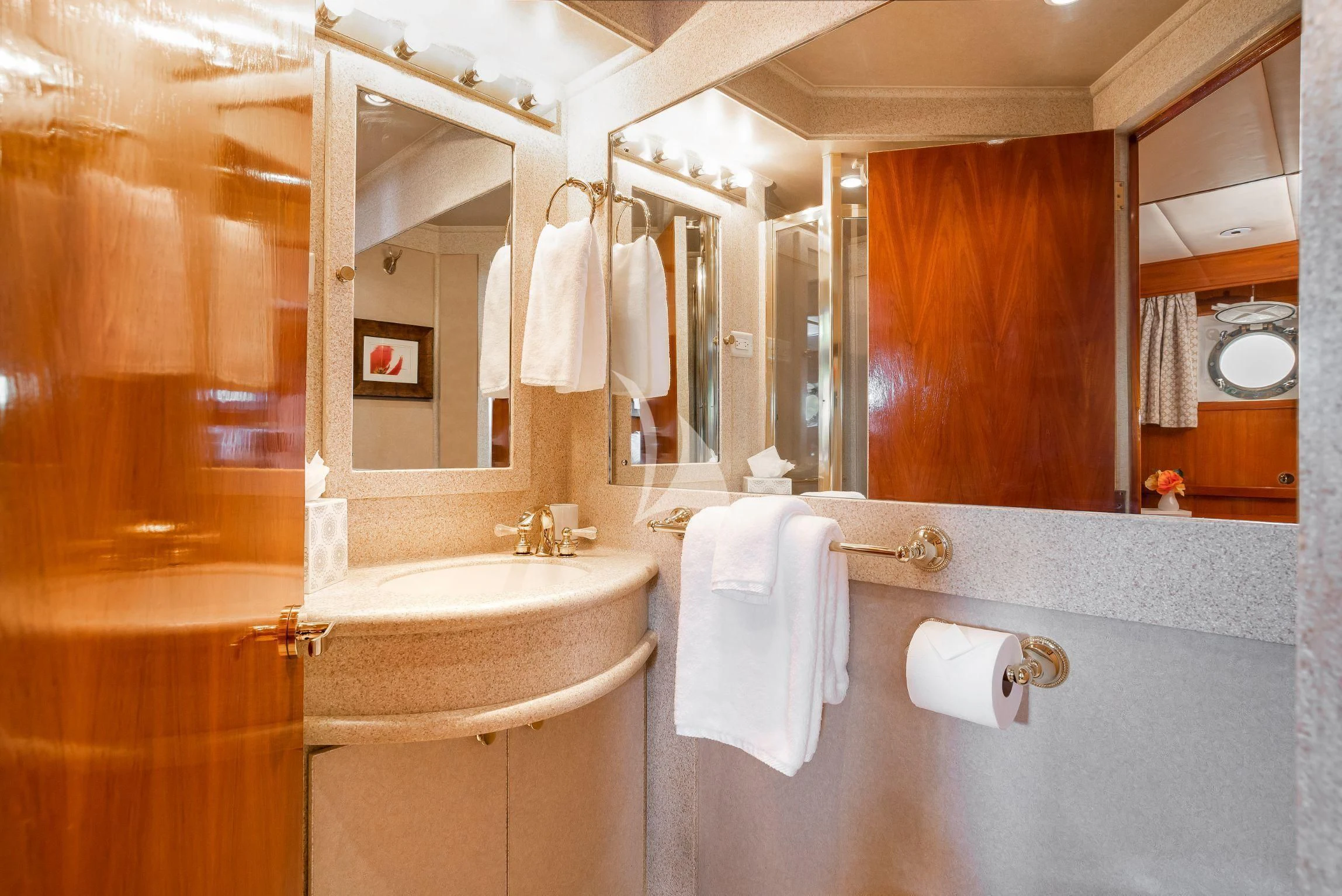 a bathroom with a bathtub and sink aboard ASKARI Yacht for Sale