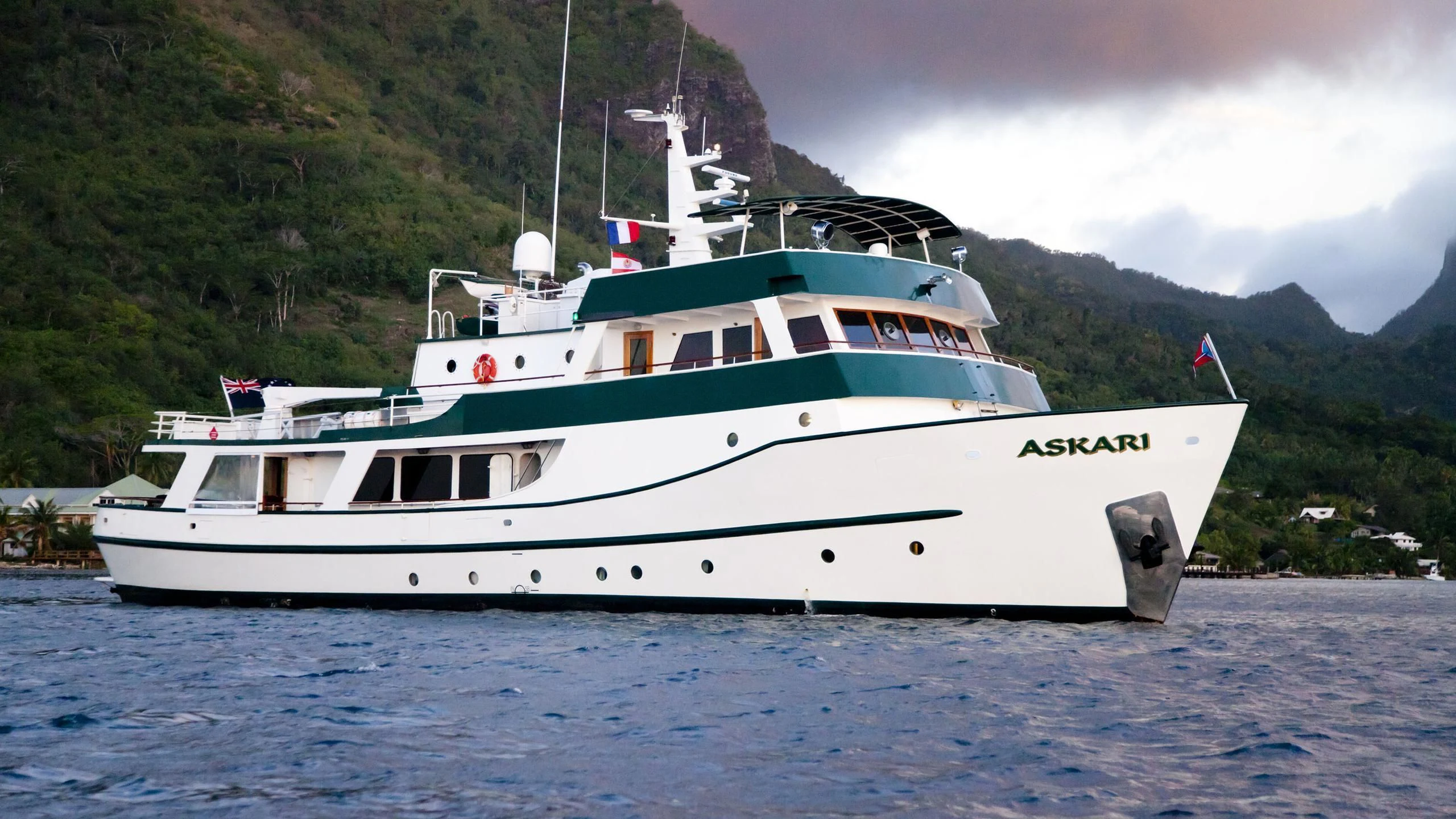 a white boat in the water aboard ASKARI Yacht for Sale