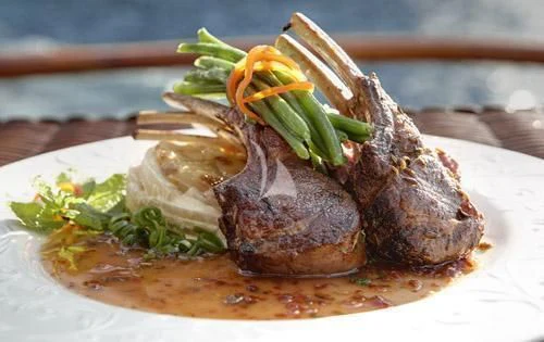a plate of food aboard ASKARI Yacht for Sale