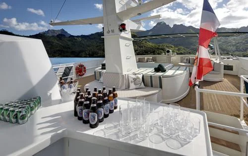 a group of bottles on a boat aboard ASKARI Yacht for Sale
