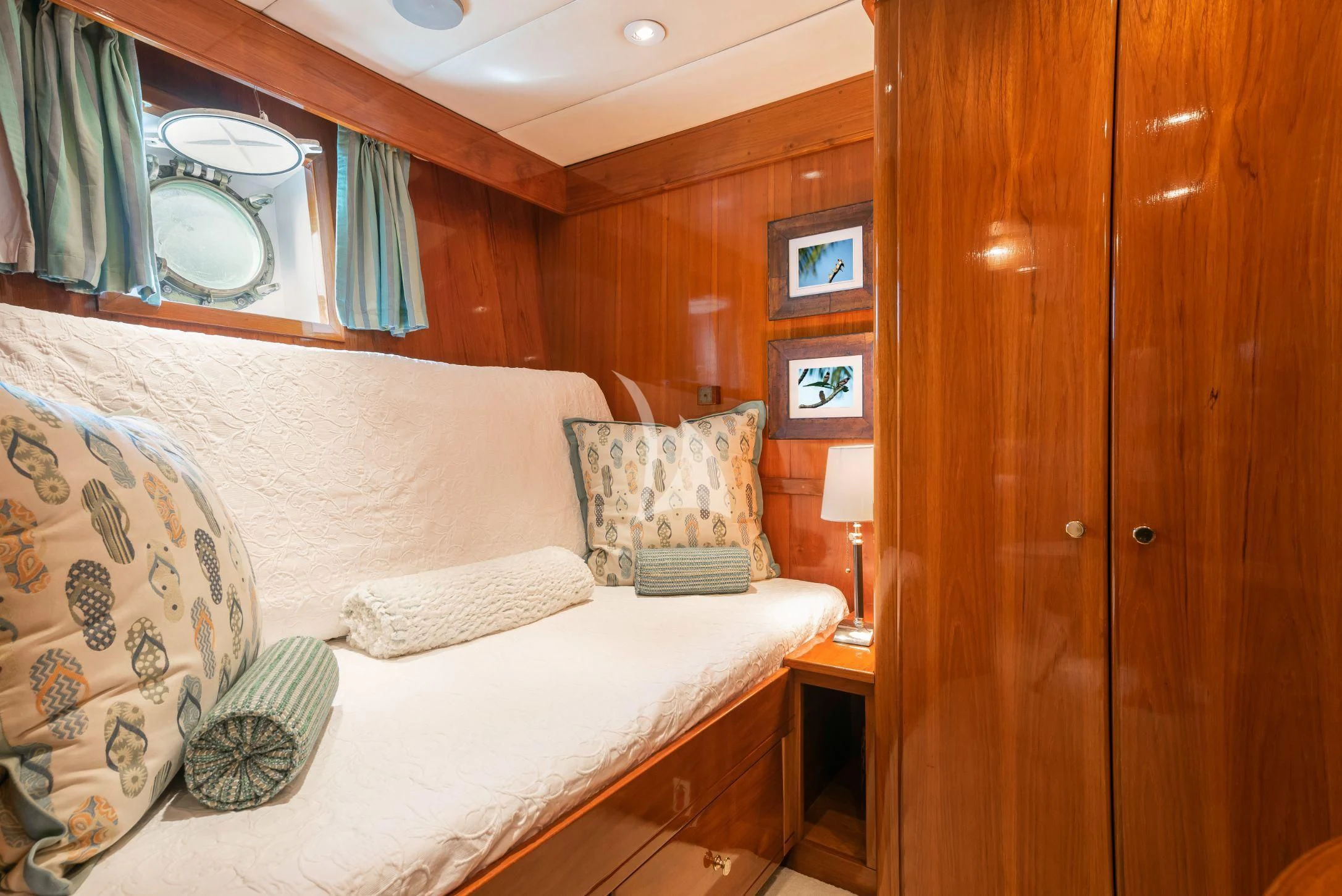a bed in a room aboard ASKARI Yacht for Sale