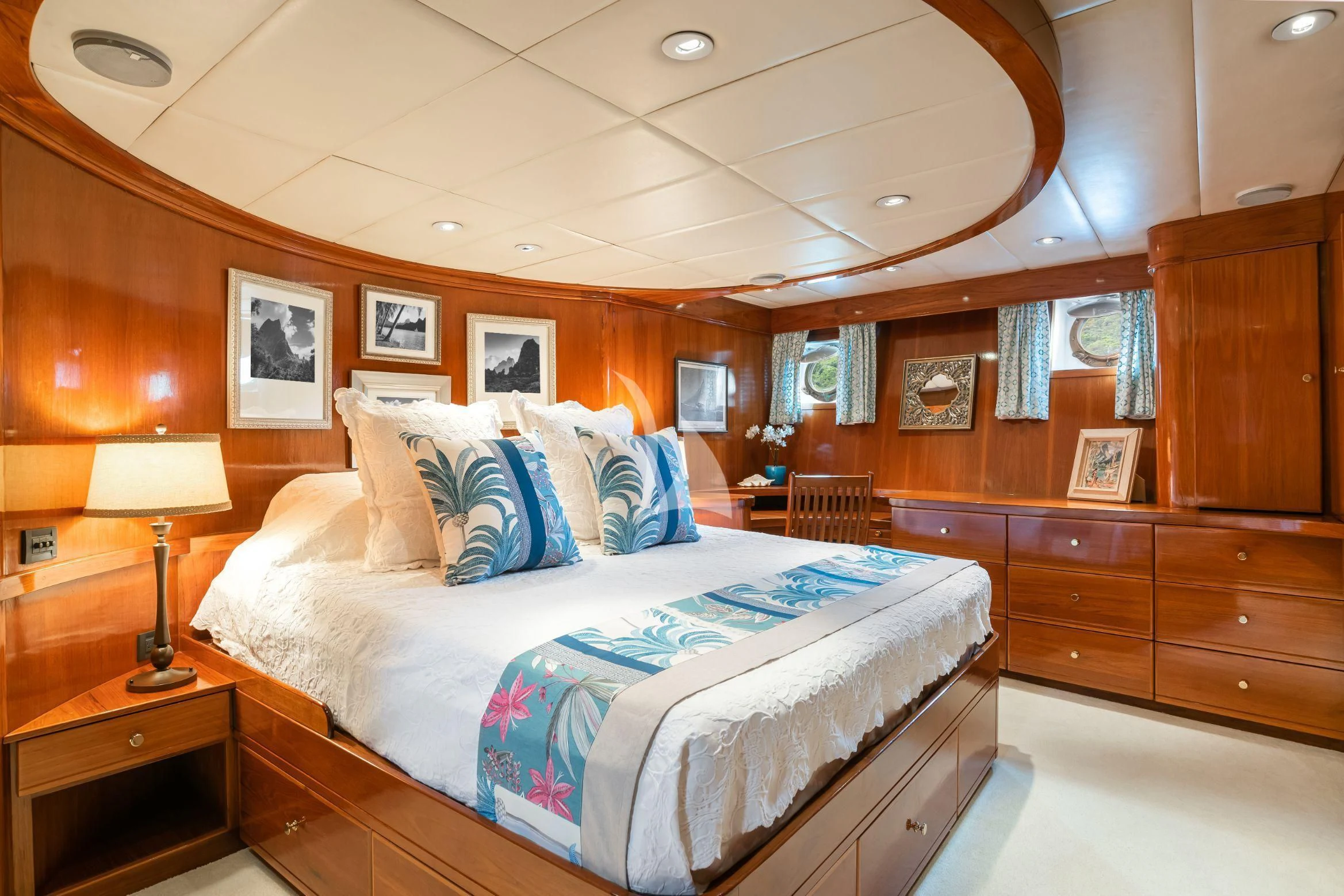 a bedroom with a large bed aboard ASKARI Yacht for Sale