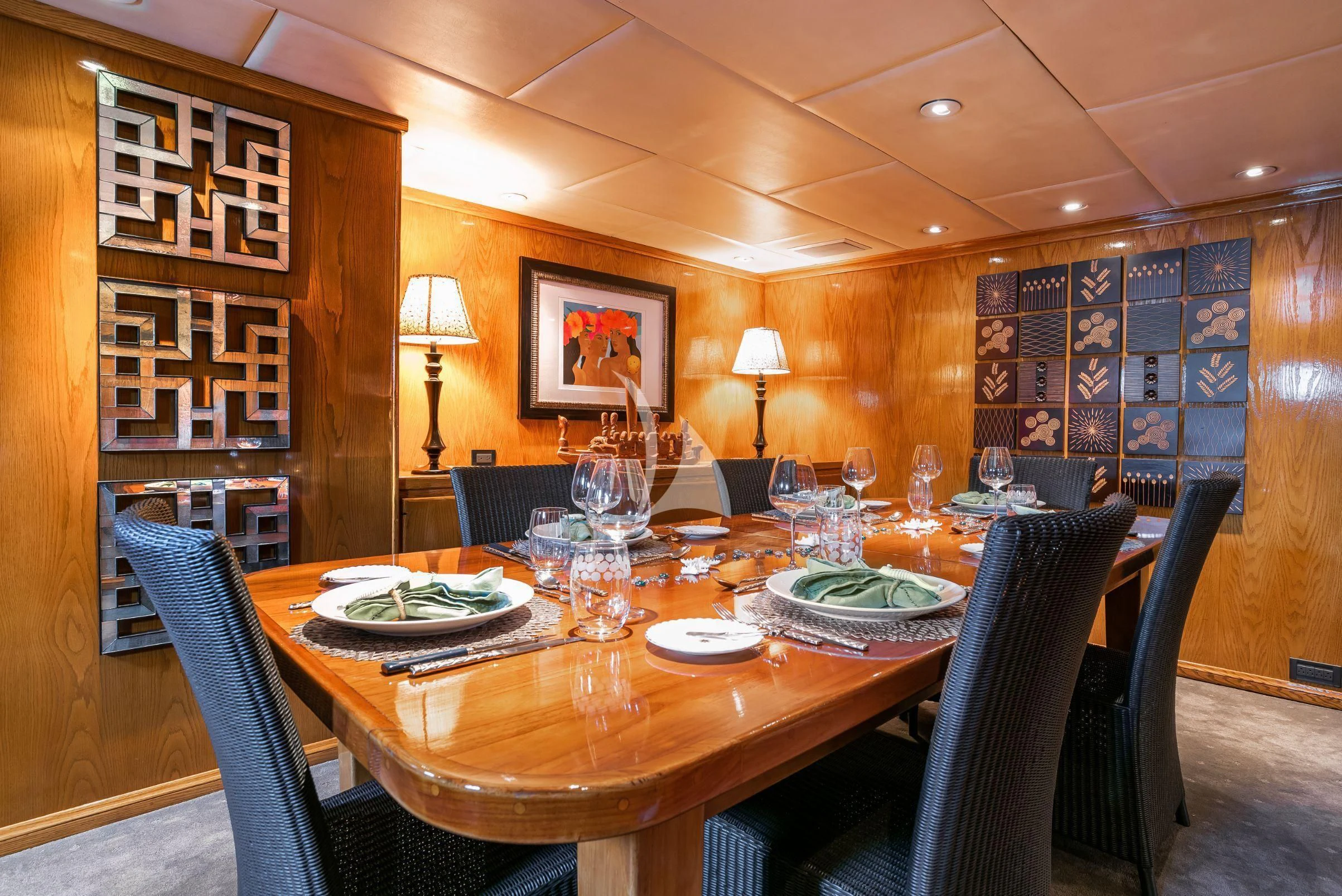 a dining room with a table set aboard ASKARI Yacht for Sale