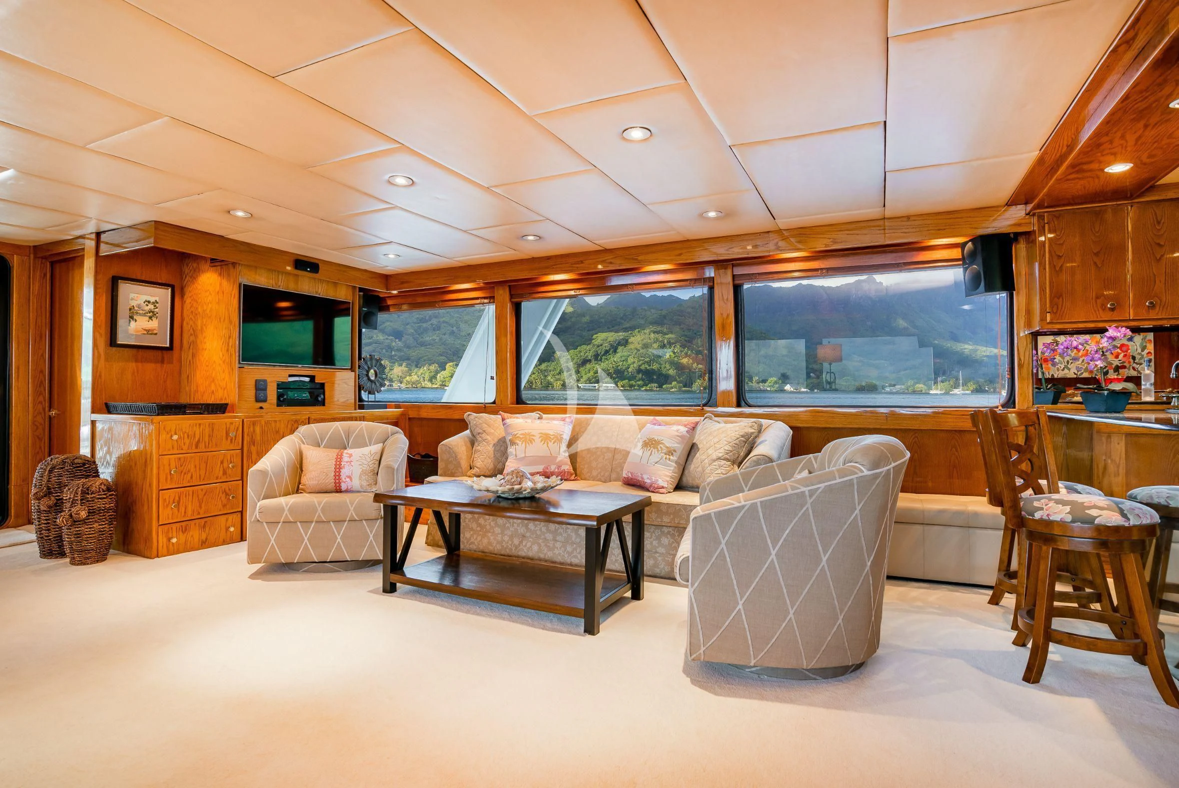 a living room with a large window aboard ASKARI Yacht for Sale
