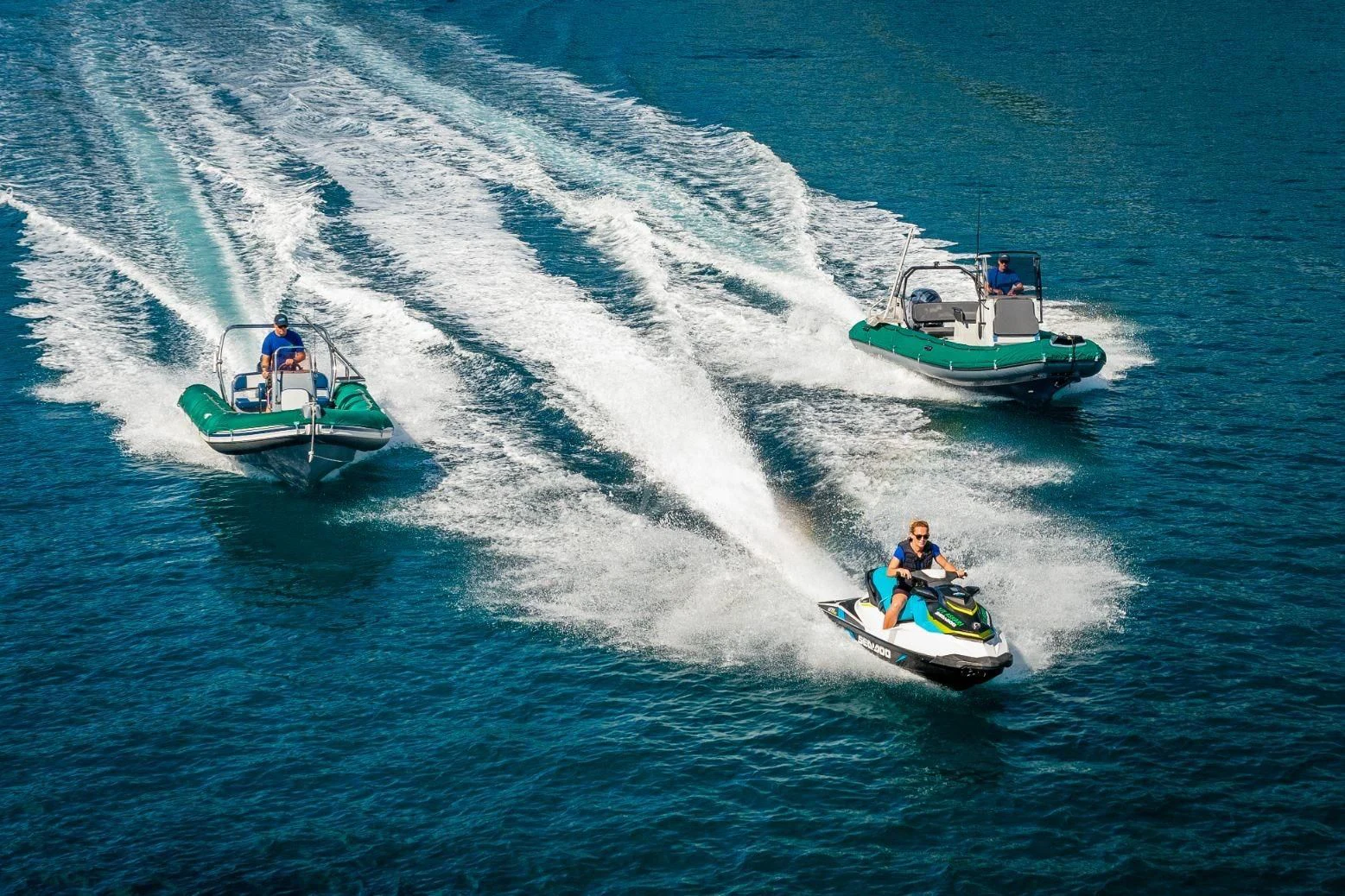 a group of people on a boat in the water aboard ASKARI Yacht for Sale