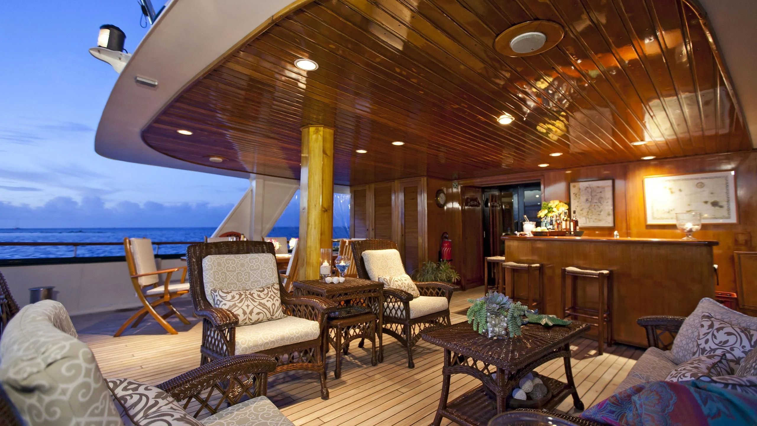 a large living room with a large balcony aboard ASKARI Yacht for Sale