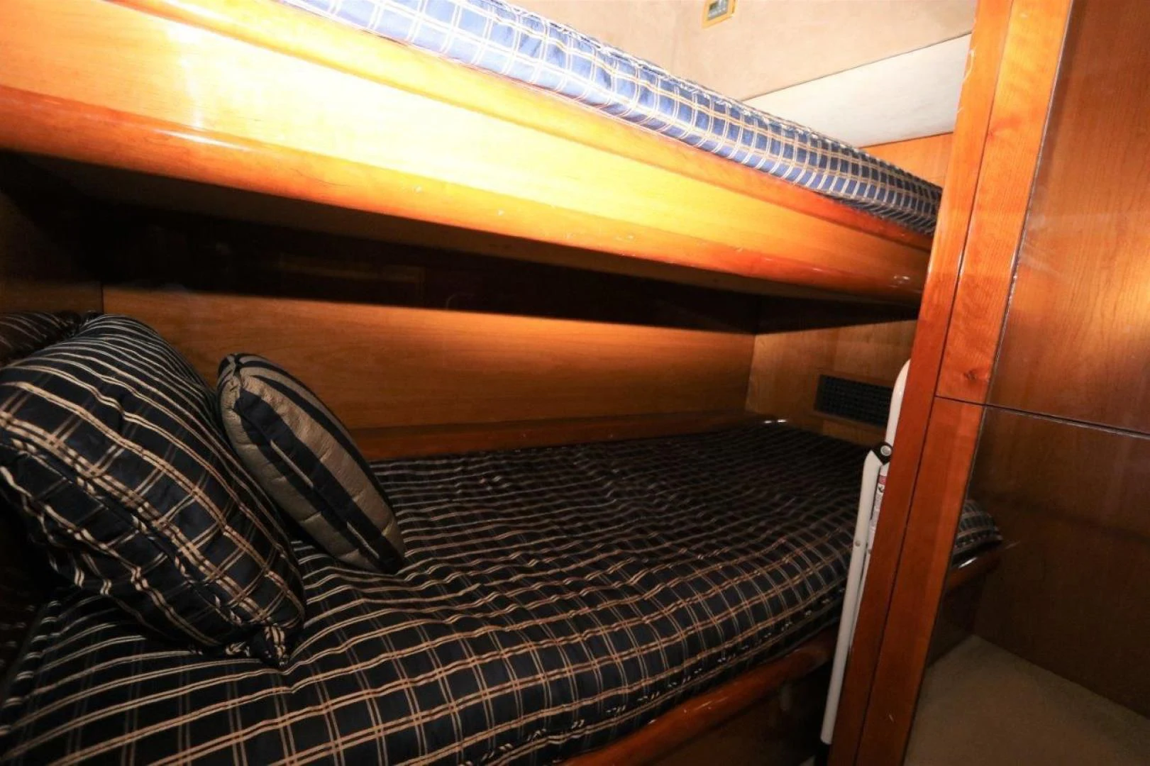 a bed with a blanket aboard SECOND THOUGHTS Yacht for Sale