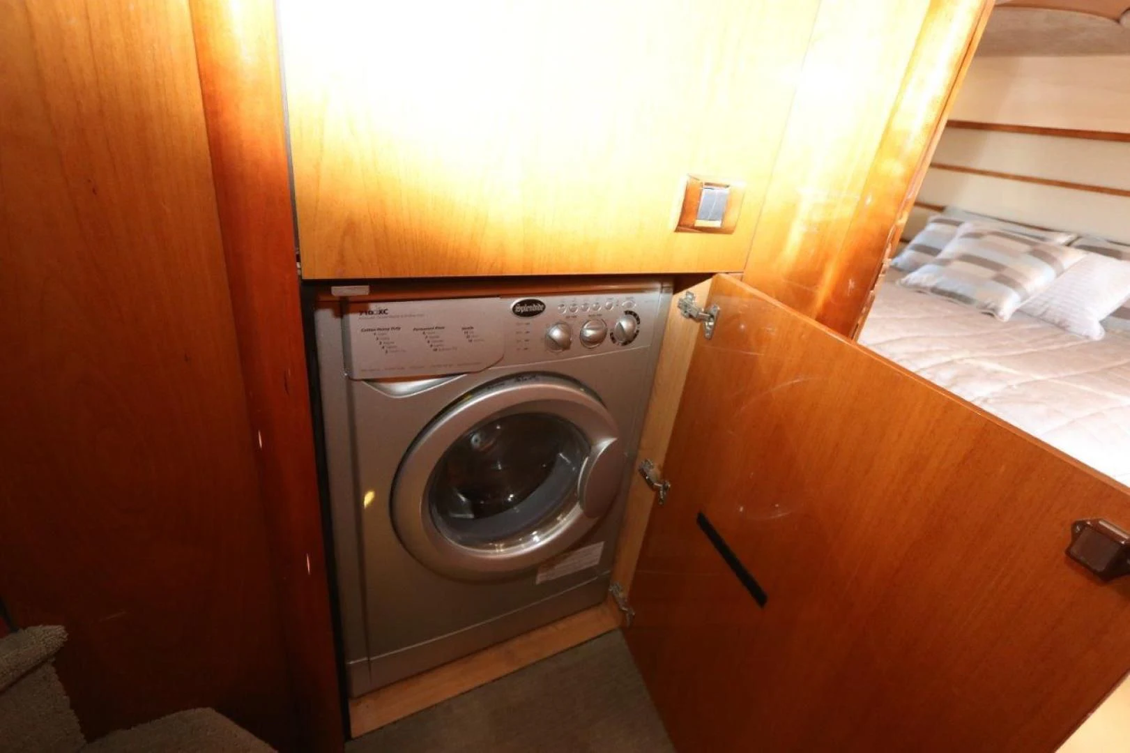 a washing machine in a room aboard SECOND THOUGHTS Yacht for Sale