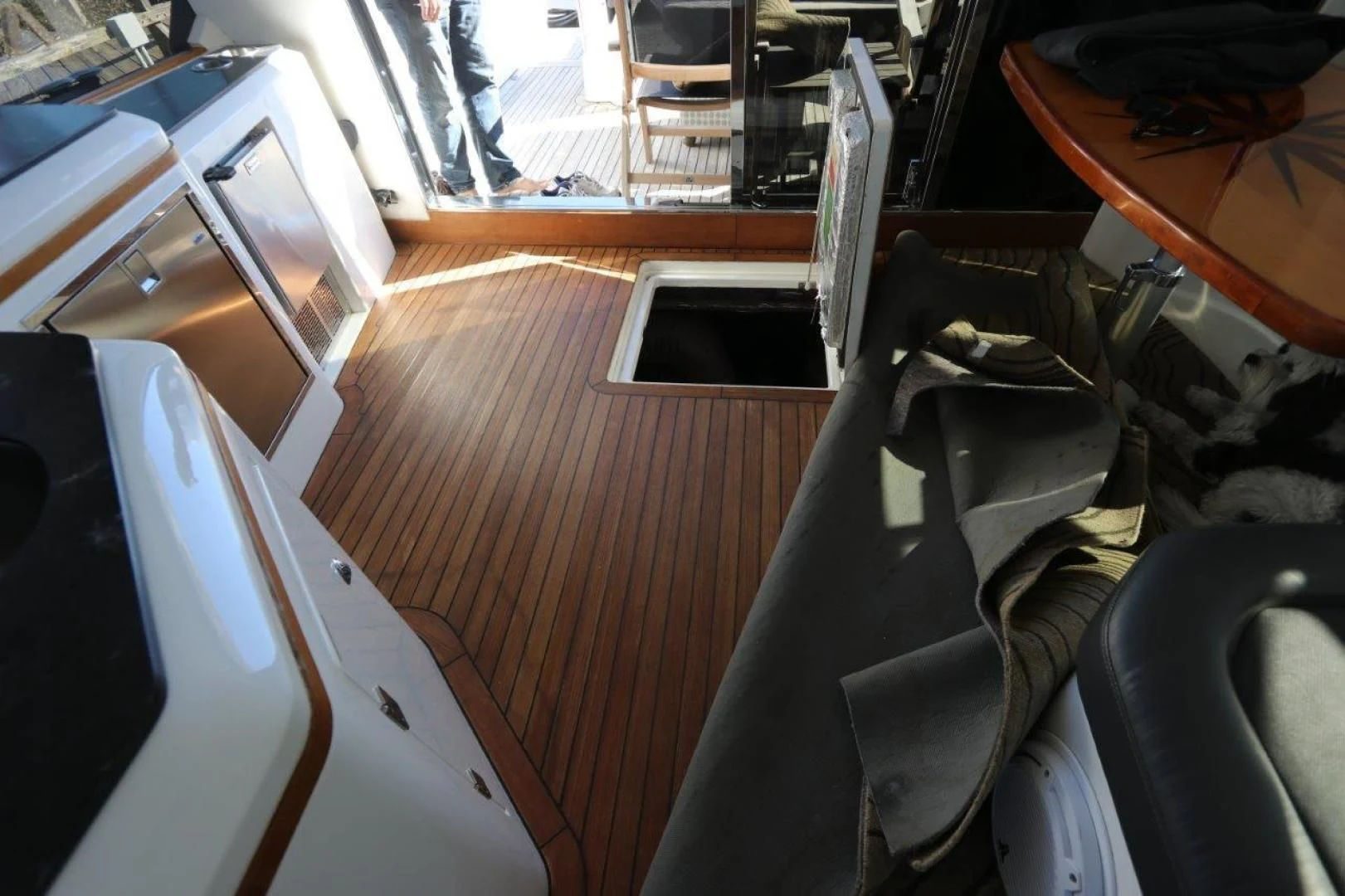 a room with a couch and a table aboard SECOND THOUGHTS Yacht for Sale