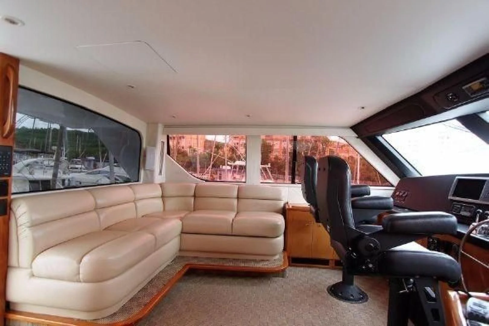 a living room with a couch and a chair aboard BROKYSTONE Yacht for Sale